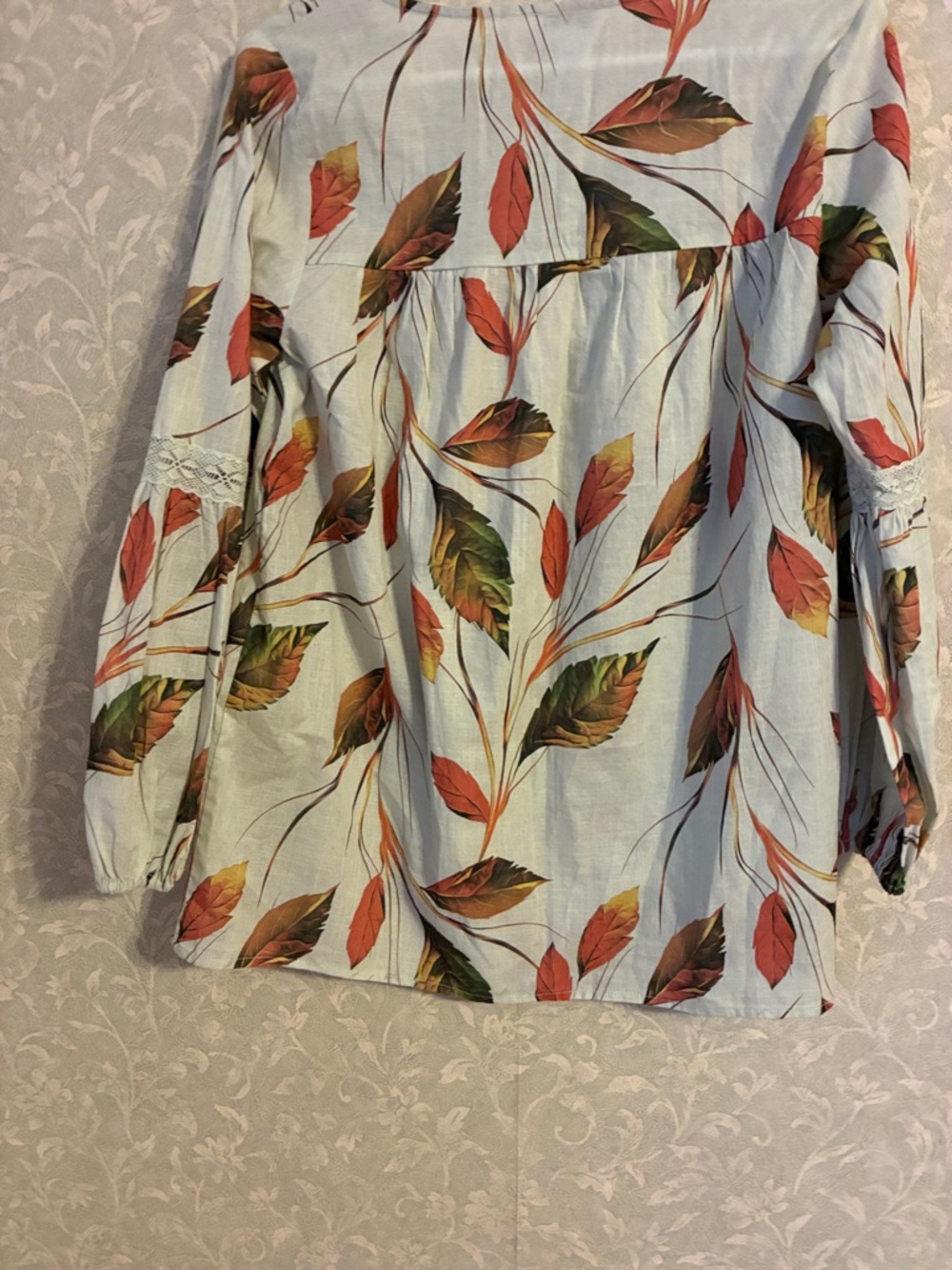 Monroe & Main cream background withLeaf-Print Peasant Top with Lace